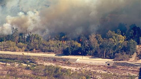 Rapidly-spreading brush fire in Riverside County prompts evacuations